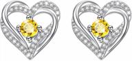 rhodium plated sterling silver heart stud earrings with cubic zirconia stones - perfect birthday gift for women and teen girls logo