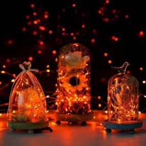 img 2 attached to 33Ft 100 LED Waterproof Orange Halloween String Lights - Battery Operated Firefly Lights With Remote Control Timer, 8 Modes For Decorative Christmas And Halloween Lighting By ANJAYLIA