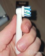img 1 attached to 💡 4 Pack of Oral-B Cross Action Electric Toothbrush Replacement Brush Heads review by Chong Eun Moon ᠌