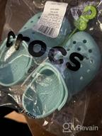 img 1 attached to Crocs Unisex Classic Toddlers Sandal Boys' Shoes review by Brian Avila