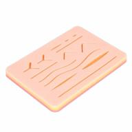 tools of medicine's advanced silicone suture pad with realistic anatomy and skin-like texture: ideal for dental, veterinary, nursing, physician assistant, medical students and surgeons logo