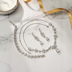 img 2 attached to Stunning Wedding Jewelry Set For Women: Y-Necklace, Tennis Bracelet, And Dangle Earrings With AAA Cubic Zirconia Teardrop Design - Perfect For Bridal And Bridesmaid Attire By BriLove