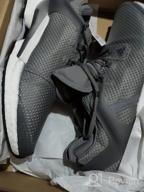 img 1 attached to Adidas Alphatorsion Boost: Performance-Packed White Athletic Shoes for Men review by Kyle Whitehead