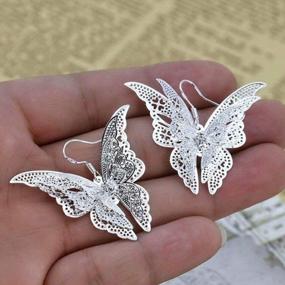 img 3 attached to Comelyjewel Women'S Silver Plated Filigree Butterfly Drop Dangle Hook Earrings (Filigree Butterfly)