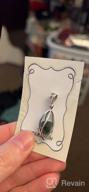 img 1 attached to Sterling Silver Cage Pendant with Rough Gemstone review by John Douglas