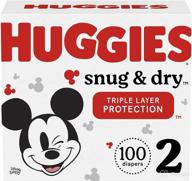 huggies snug baby diapers 12 18 logo