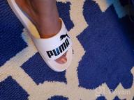 картинка 1 прикреплена к отзыву PUMA Popcat Athletic Slide Sandal for Men in Black - Ideal Footwear от Jeffrey Dunn