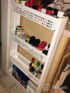 img 1 attached to 4-Tier Slim Slide-Out Tower Rack Shelf Organizer For Narrow Spaces - Perfect For Kitchen, Bathroom, Dining, And Laundry Rooms By Famistar review by Quinton Dawon