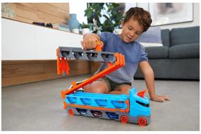 img 1 attached to Hot Wheels City Track Track Truck Expressway with Car Storage GVG37
