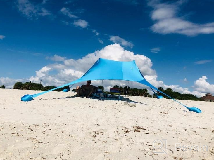 img 1 attached to Portable Beach Tent Sun Shelter 10X10Ft UPF50+ Protection With 4 Sand Bags & Aluminum Poles For Family Camping, Outdoor And Beach Use. review by Cesar Hubbard