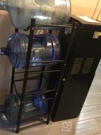 img 1 attached to LIANTRAL 5 Gallon Water Jug Holder Water Bottle Storage Rack, 4 Tiers, Black review by Michael Glassburn