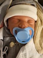img 1 attached to Realistic Lifelike Full Silicone Baby Doll - Boy With Closed Eyes: 18-Inch Sleeping Newborn Lookalike, Not Vinyl review by James Murphy