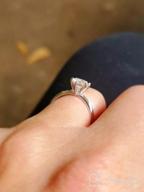 img 1 attached to 1 Carat Classic Round Moissanite Engagement Ring In 14K White Gold - GH/VS Clarity review by Amy Smotherman