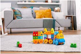 img 1 attached to Musical Train Alphabet Construction Set for Kids - Mega Bloks FWK22