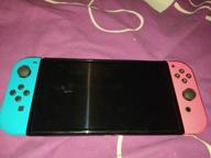 img 2 attached to Game console Nintendo Switch OLED 64 GB, white review by Jnis Kalni ᠌
