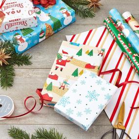 img 3 attached to 🎁 Hallmark Reversible Christmas Wrapping Paper - Rustic Santa, Snowmen, Candy Canes, Stripes, Snowflakes - 3 Rolls, 120 sq. ft. total - 'Merry Christmas to You'
