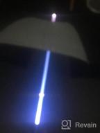 img 1 attached to Shine In The Rain With BESTKEE Lightsaber Umbrella - 7 Color LED Shaft & Bottom Torch (Red) review by Micheal Chaplain