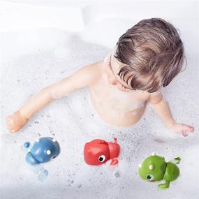 img 1 attached to 🦖 LiKee Floating Wind-up Dinosaurs Baby Bath Toys - Water Play Gift for Bathtub, Shower, Beach - Swimming Pool Games for Infant, Toddler, Kids - Boys & Girls Age 3 to 6 Years (Triceratops)