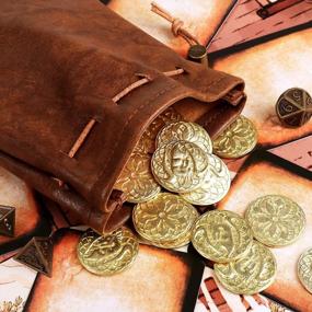 img 2 attached to Набор фэнтезийных монет с сумкой из искусственной кожи - 50 золотых металлических монет для настольных игр, Dungeons &amp; Dragons и настольных ролевых игр - средневековые ретро-аксессуары и игровые жетоны