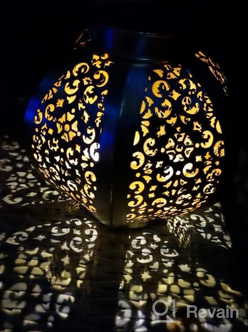 img 1 attached to Enhance Your Outdoor Space With OxyLED Solar Lanterns - 2 Pack Hanging Decorative Lights For Garden, Patio, And More! review by Andy Quade