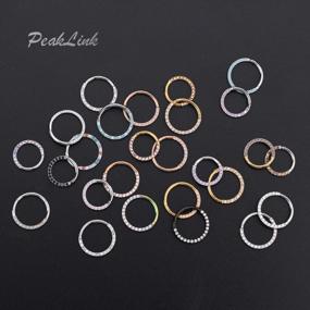 img 1 attached to Stylish Stainless Steel CZ And Opal Septum Clicker Ring For Piercings - Perfect For Nose, Helix, Cartilage, Tragus, Lobe Or Belly Hoops