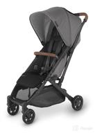 🚼 minu v2 stroller in charcoal mélange/carbon with saddle leather accents logo