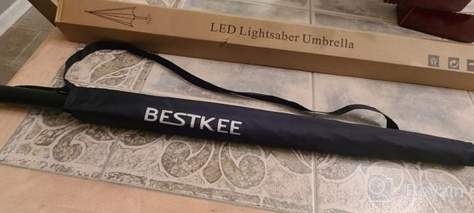 img 1 attached to Be The Envy Of Everyone On The Course With BESTKEE LED Lightsaber Golf Umbrella - 7 Color Changing Shaft And Built-In Torch! review by James Hardin