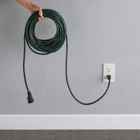 img 1 attached to Green 50Ft Indoor/Outdoor Extension Cord - 3-Prong, 13Amp, 1625W, 125V - Amazon Basics
