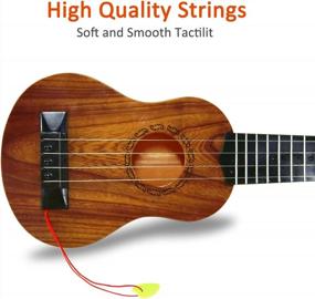 img 2 attached to QDH Kids Toy Ukulele With Pick, 17-Inch 4 Steel Strings, Wooden Color - Educational Musical Instrument Gift For Preschool Children, Ages 3-6