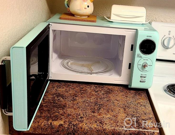 img 1 attached to Winia WOR07R3ZEL 0.7 Cu. Ft Retro Microwave, City Blue review by Amanda Rochon