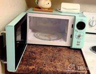 img 1 attached to Winia WOR07R3ZEL 0.7 Cu. Ft Retro Microwave, City Blue review by Amanda Rochon