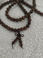 img 1 attached to 108 Prayer Beads Mala Bracelet: Natural Wood Tibetan Buddhist Buddha Meditation Necklace Mala Bracelet for Ultimate Mindful Experiences review by Kevin Vanlaere
