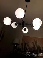 картинка 1 прикреплена к отзыву Liara Caserti Black Sputnik Chandelier - Modern Ceiling Light with 6 Glass Globe Lights - Mid Century Modern Chandelier for Dining Room, Kitchen, Bedroom - Sputnik Light Fixture, UL Listed от Rudy Barron