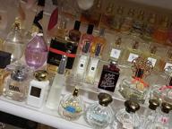 картинка 1 прикреплена к отзыву WINKINE Acrylic Riser Display Shelf: Versatile 4-tier Organizer for Perfumes, Amiibo and Funko POP Figures от John Mahfood