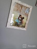 img 1 attached to Transform Your Wall Or Tabletop With Upsimples 5X7 Picture Frames - Set Of 6 In Distressed White With Real Glass review by Devon Leach