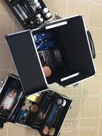 картинка 1 прикреплена к отзыву Professional Rolling Makeup Case By OUDMAY - 2 In 1 Aluminum Storage Organizer With Locks & Folding Trays (Pink) от Raj Mazzabufi