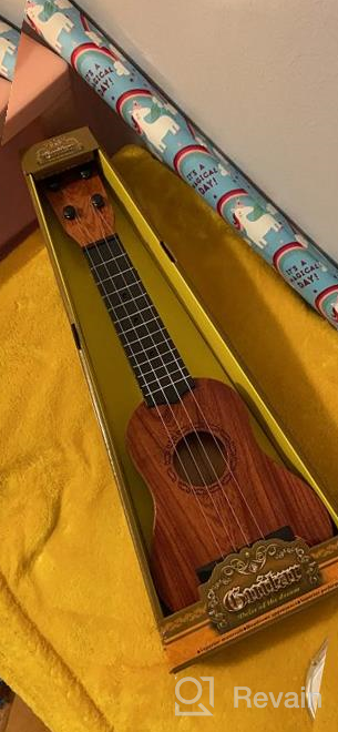img 1 attached to QDH Kids Toy Ukulele With Pick, 17-Inch 4 Steel Strings, Wooden Color - Educational Musical Instrument Gift For Preschool Children, Ages 3-6 review by Douglas Hall