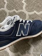 img 1 attached to 💯 Classic Style Meets Comfort: New Balance Kids' 574 V1 Lace-Up Sneaker review by Darin Grosz