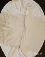 картинка 1 прикреплена к отзыву Плиссированная теннисная юбка YOLIX для женщин - белые шорты для гольфа с карманами для бега и тренировок от Deandre Kamaludin