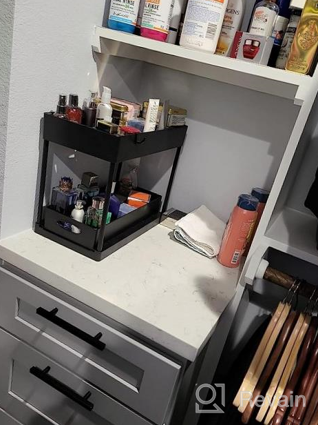 img 1 attached to 2-Tier Sliding Cabinet Organizer With Hooks And Hanging Cup - Multi-Purpose Bathroom And Kitchen Storage Solution By SOLEJAZZ, Stylish Black Under-Sink Organizer review by Lakshmi Pennington