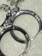 img 1 attached to 💫 Sparkling Sterling Silver Hoop Earrings with Reffeer Crystals: Star Moon Dangle Design for Women and Teen Girls review by Ashley Rice