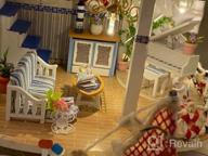 img 1 attached to DIY Miniature Dollhouse Kit - 1:24 Scale Beachside Bungalow W/ Furniture & Dust Proof | Great Handmade Crafts Gift For Birthday Thanksgiving Christmas review by Rachel Harris