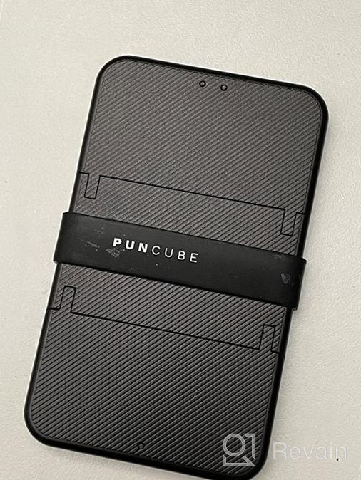 img 1 attached to Streamline Your Space with PUNCUBE Holder: A Minimalist Organizer with Blocking Capabilities review by Pogo Shakey