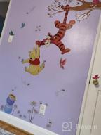 img 1 attached to Sweeten Your Walls With RoomMates Winnie The Pooh Swinging For Honey Wall Decals! review by Kent Kings