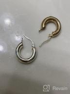 img 1 attached to Stylish Chunky Hoop Earrings for Women - Shiny Polished Round-Tube Hoops with Sterling Silver Posts: Perfect Gift for Women and Girls review by Christopher Rodriguez