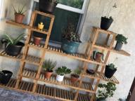 img 1 attached to Stylish And Versatile Wooden Flower Stand With Multiple Shelves - Perfect For Plant Displays review by Jessica Fields