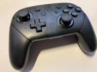 img 1 attached to Nintendo Switch Pro Controller gamepad, black review by Agata Roguska ᠌