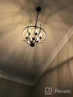 img 1 attached to Rustic Orb Chandelier With Adjustable Height - TZOE 4-Light Metal Vintage Chandelier For Dining Room, Living Room, And Kitchen review by Elijah Harvey