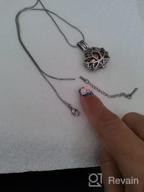 картинка 1 прикреплена к отзыву Ожерелье с подвеской в форме цветка лотоса для хранения праха от Krystal Marie