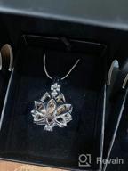 img 1 attached to Lotus Flower Shaped Cremation Jewelry Urn Pendant Necklace for Ashes review by Patricia Pena